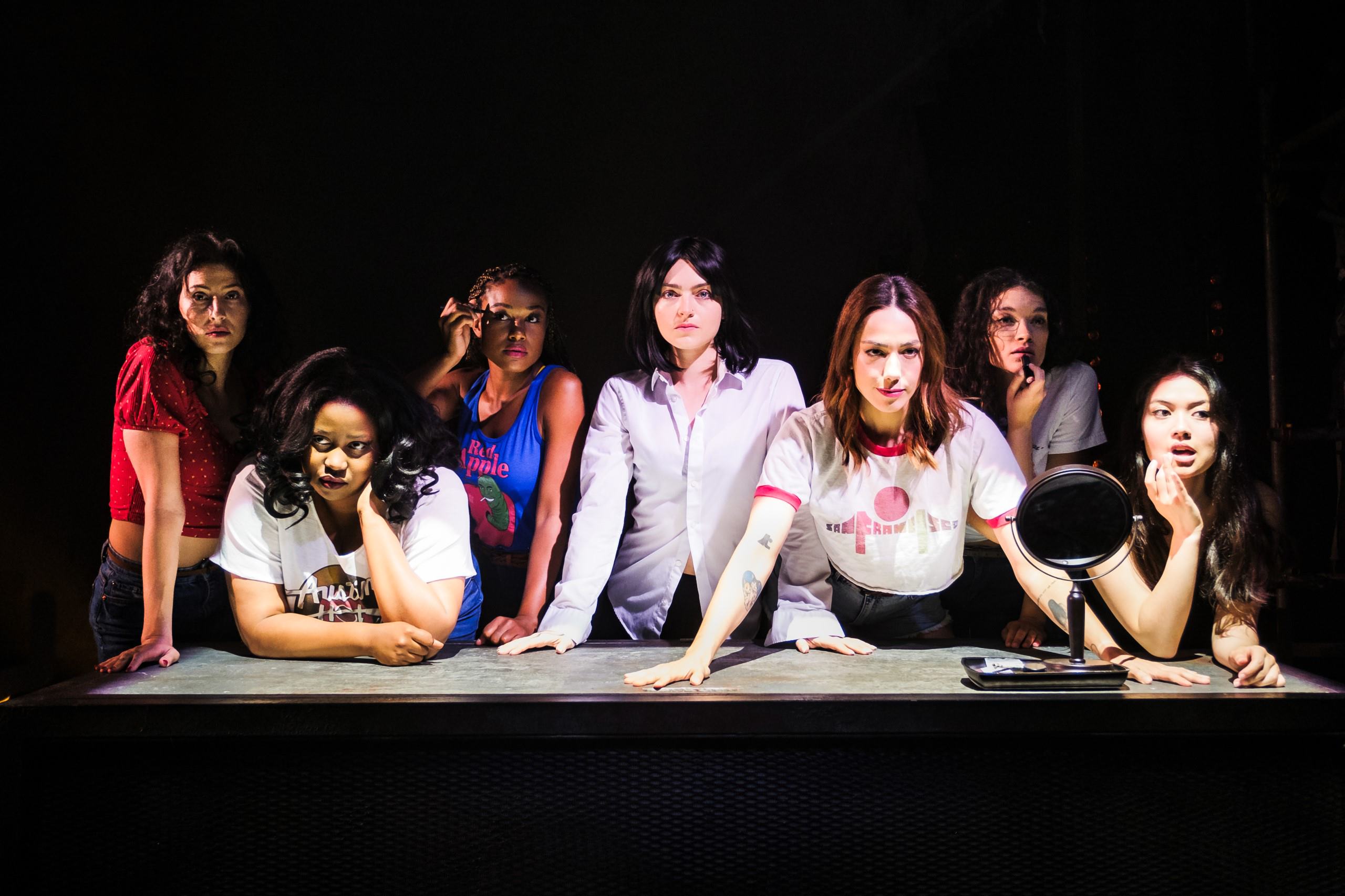 Tarantino Live's female cast members looking into the camera